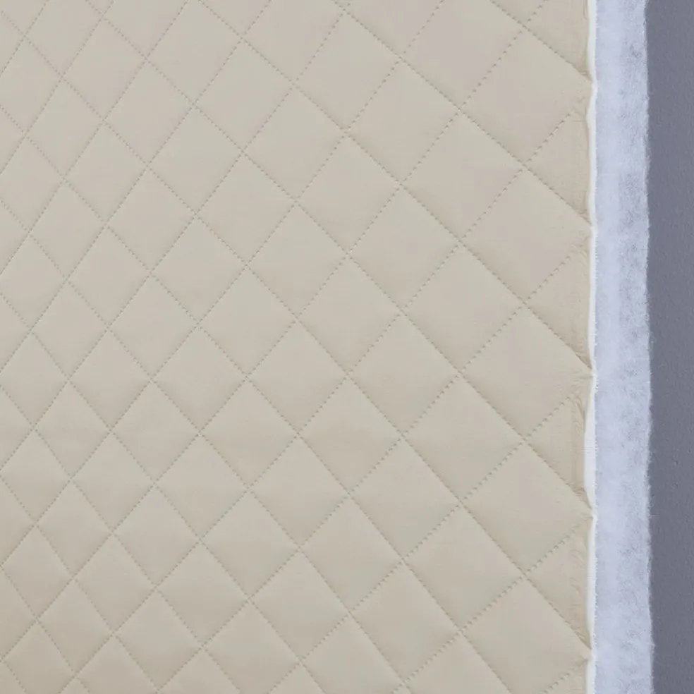 Niva XL ljusbeige fuskskinn