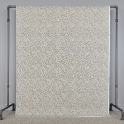 Ramas beige tyg med kvistar och blad